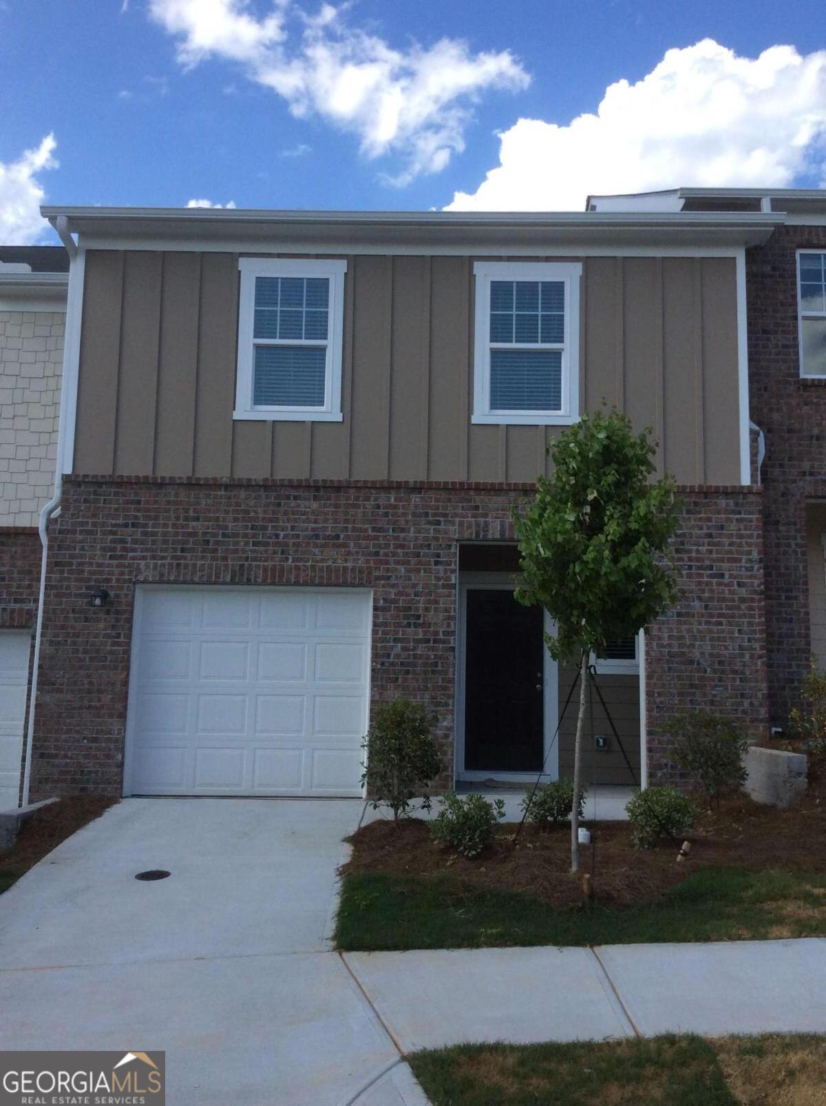Lockbox on front door, applications on website, agent must be at showings, Upscale town home with newer carpet, extended flat ceilings, open floor plan, stainless steel appliances, large rooms, with walk in closets, solid surface counter tops.