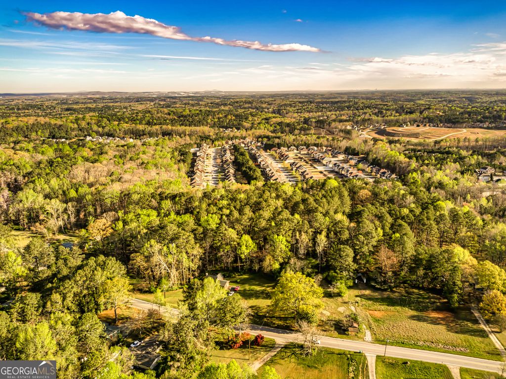 Photo of 4380 Stonewall Tell Road, South Fulton, GA 30349 (MLS # 10655354)