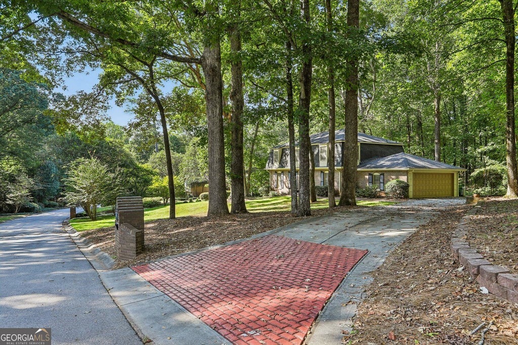 Photo of 4988 Mountclaire Road, Stone Mountain, GA 30087 (MLS # 10852805)