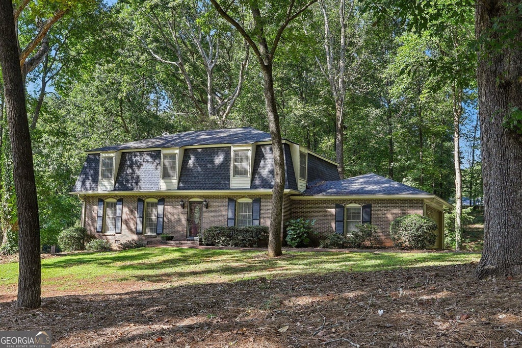 Photo of 4988 Mountclaire Road, Stone Mountain, GA 30087 (MLS # 10852805)