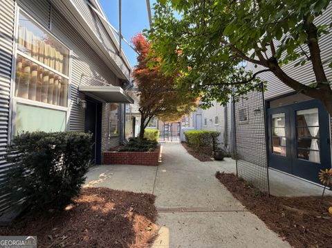 Photo of 400 Village Parkway NE #APT 142, Atlanta, GA 30306 (MLS # 10728045)