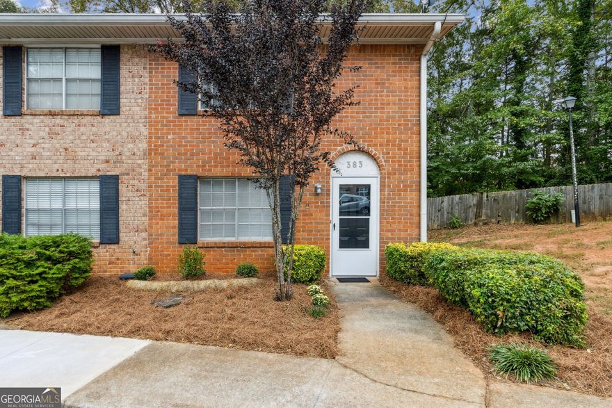 Prime location and move-in ready. Renovated end unit in Northdale Condominiums, just minutes from The heart of Booming Lawrenceville.  Easy access to Georgia Gwinnett College, Northside Hospital, and major thoroughfares to the conveniences of Metropolitan Atlanta (GA 316 and I-85).  Upgraded on both levels with LVP flooring, fresh paint, contemporary features including new light fixtures, and ceiling fans.  Unique to Northdale Condominiums, this townhome offers the opportunity of a bedroom and full bath on the main level.  The living room/flex room with a closet can be used as a third bedroom since the half bath on the main level has been beautifully upgraded and converted to a full bath with a shower/tub.  A 2nd full bathroom upstairs (also upgraded)  is shared by 2 generous bedrooms, each with a spacious walk-in closet.  The kitchen has been upgraded with stainless steel appliances granite countertops, stainless steel undermount sink with gooseneck pullout spray.  Stainless steel appliances include French door refrigerator with door front water/ice dispenser,  electric stove with self-cleaning oven, microwave oven with vent hood, and brand new dishwasher. The dining room has a wall of windows viewing a private patio, which is an outdoor space ideal for relaxing, dining, and entertaining.  There is extra storage space inside under the stairs and in a storage room accessed from the patio. Washer and dryer included.  2 reserved parking spaces are just steps from your door, in front of the building, both marked "383".    New equipment includes a heat pump installed 9/12/2025 and a water heater approx.1 year old.  Exterior dwelling and yard maintenance, as well as termite and pest control are provided by the HOA.  Properties of this quality in a hot market like Lawrenceville today move quickly.  Don't let the opportunity pass you by.