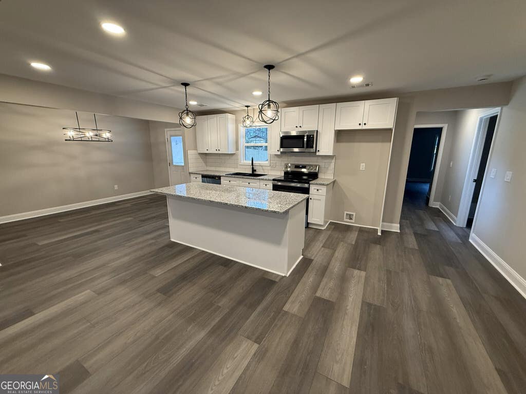 Photo of 7167 Brown Bridge Road, Covington, GA 30014 (MLS # 10801643)