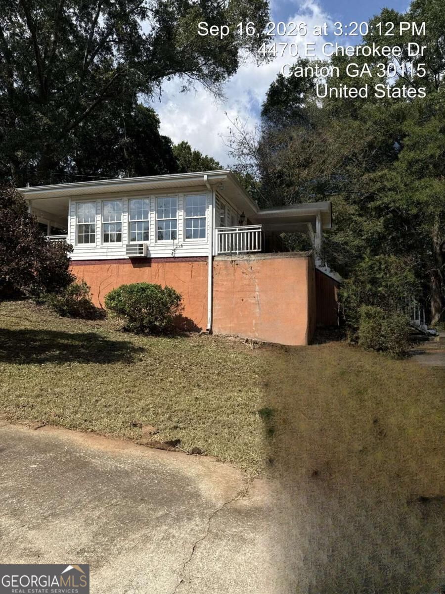 Photo of 4470 E Cherokee Drive, Canton, GA 30115 (MLS # 10851127)