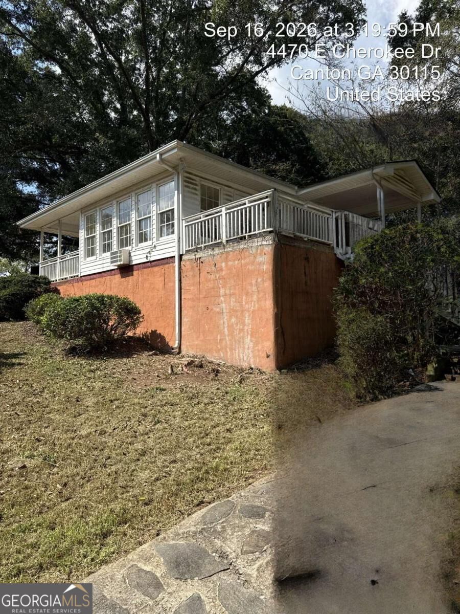 Photo of 4470 E Cherokee Drive, Canton, GA 30115 (MLS # 10851127)