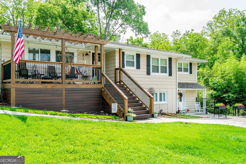 Enjoy lake living in this beautifully renovated lower-level 2-bedroom, 1-bath home just a short stroll less than 0.5 miles from Acworth Beach. This bright and inviting space showcases fresh updates throughout, including brand new flooring, new appliances, updated bathroom, a spacious kitchen area, and modern finishes that blend comfort with style. The home offers a private entrance, and a generously sized living area-perfect for relaxing after a day at the lake. Both bedrooms provide ample closet space. Located in a quiet neighborhood, you'll be within walking distance to downtown Acworth shops, dining, and parks, with easy access to outdoor activities and I-75. Don't miss this opportunity to live near the lake in a refreshed and convenient home. Schedule your tour today!