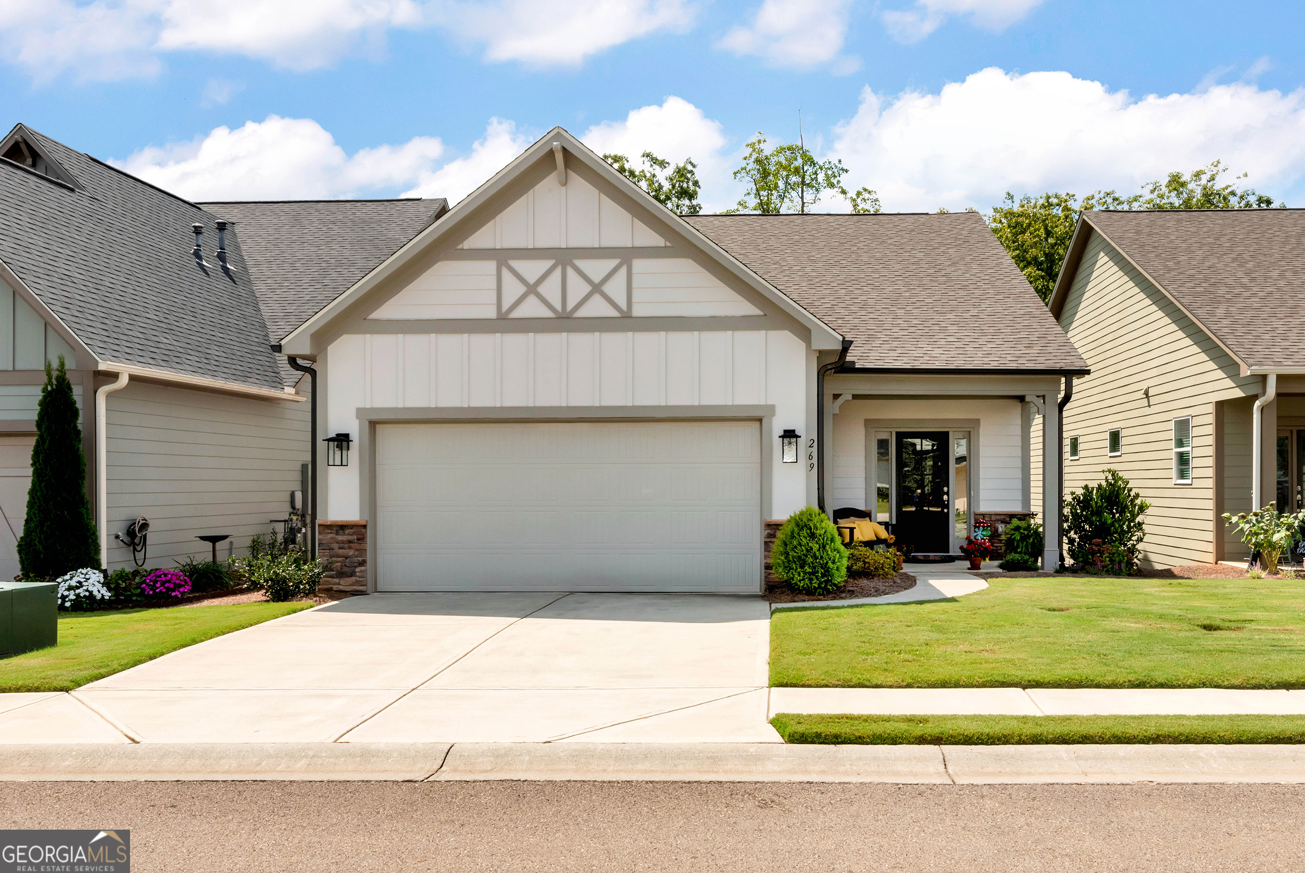 Beautiful ranch home in a highly sought-after 55+ community offering comfort, convenience, and endless potential. Main level features 2 bedrooms and 2 baths including an owner's suite with double vanity and tile shower, plus an additional bedroom and full bath. The open layout connects the living, dining, and kitchen areas seamlessly, with solid-surface counters, stainless steel appliances, gas range with vent hood, and island seating. The full basement is plumbed and ready for a bath and small kitchen, providing opportunity to add extra bedrooms, a guest suite, or a private apartment to suit your needs. Enjoy privacy with wooded views from the back of the home while taking advantage of the active community lifestyle that includes sidewalks, streetlights, pickleball, weekly card games, book club, pool volleyball, and clubhouse activities. HOA dues cover basic cable, Wi-Fi, trash, and lawn maintenance. Conveniently located just 1.1 miles from Piedmont Mountainside Hospital and 3 miles from Publix.