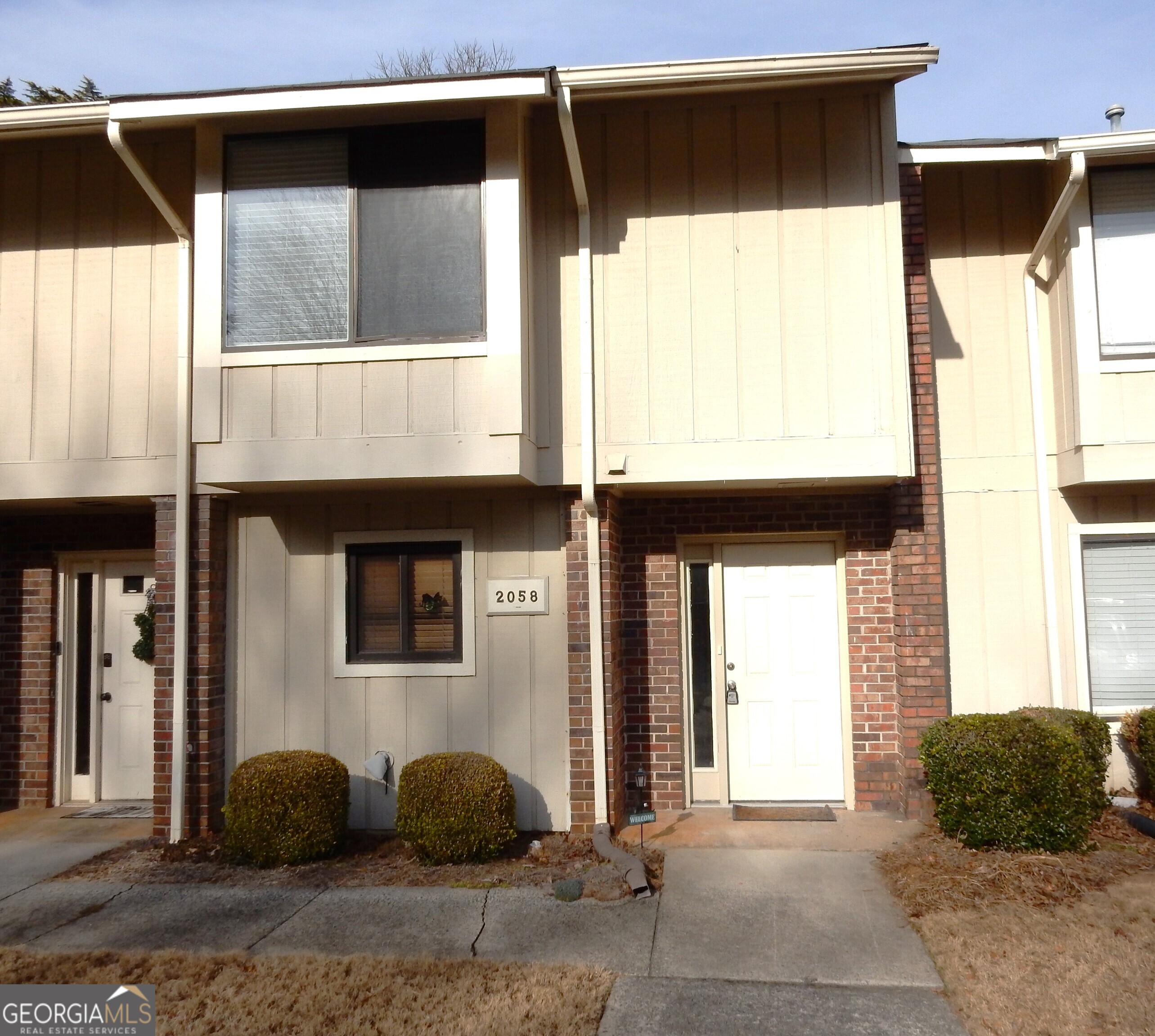 Come see this ready to move-in townhome in the well established, highly sought-after Covered Bridge Community. The convenient location is close to Atlanta with easy access to major highways, Braves stadium and the Battery, shopping and dining venues, plus nearby parks. Highly rated Marietta schools are also a major appeal. Entry foyer leads to the spacious dining room with volume ceiling. The large kitchen is open to the dining room and features stainless steel appliances with tons of counter and cabinet space plus a handy pantry. The large family room features a cozy fireplace and opens to the private enclosed rear porch and patio. Upstairs you will find two primary bedroom suites, each with their own private bathroom and ample closet space. You will enjoy this quiet tucked away community with pool and tennis court.