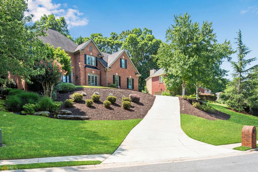 Nestled back on a beautifully landscaped lot sits this gorgeous well-maintained home located in the highly sought-after community of Aberdeen. New custom double doors lead you into the two-story elegant foyer adjacent to a study and formal living room that leads to the spacious dining room. The main level of this home features gleaming hardwood floors throughout, The large bright kitchen features a breakfast area, stainless steel appliances, granite countertops and walk-in pantry. Kitchen opens to the family room which features built-in bookshelves flanking each side of the cozy brick fireplace. Double French doors lead from the kitchen to the covered pergola and beautifully landscaped backyard with plenty of room to host your next family gathering or BBQ. Double staircases lead to the upstairs level where you will find three spacious secondary bedrooms, one jack and jill bathroom in addition to the primary suite. The primary suite is your respite at the end of the day in an oversized Master bedroom with trey ceiling, built-in bookcases and a cozy sitting room. The luxurious ensuite master bath is appointed with a deep soaking tub, frameless shower, separate vanities with granite countertops and large walk-in closet. All new carpeting encompasses the entire upper and terrace level. Gear up for the big game on the large finished terrace level with tons of storage space or enjoy working out in the home gym. Host guests in the well-appointed separate guest bedroom and full bath. Enjoy the amenities this community offers including a Junior Olympic Sized Swimming Pool and Pavilion, Gorgeous Club House, and Lighted Tennis Courts. Conveniently located to shopping and dining.
