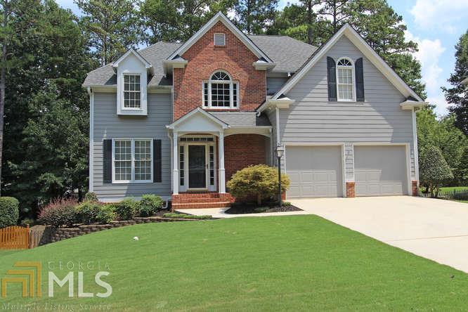 STUNNING DESCRIBES THIS GORGEOUS HOME!FORMAL LIVING & DINING RMS WELCOME YOU INSIDE W/CUSTOM MOLDING. FAMILY RM FEATURES BUILT-IN BOOKCASES & WALL OF WINDOWS.KITCHEN W/NEWLY FACED CABINETS/GRANITE COUNTERS/SS APPLIANCES/HDWD FLRS/RECESSED LIGHTING. UPSTAIRS MASTER RETREAT W/HIS & HER CLOSETS & SPA MASTER BATH W/JETTED TUB.SECONDARY BDRMS ARE LARGE AS WELL. FINISHED RM IN BASEMENT WOULD MAKE GREAT MEDIA RM/WORKSHOP & STORAGE ROOMS. CUSTOM SCREEN PORCH W/SURROUND SOUND & DECK! FENCED YARD. NEWER ROOF/NEW EXTERIOR PAINT/1 NEW HVAC/NEW HOT WATER HEATER/CUSTOM LANDSCAPING/NEW CARPET AND NEW PAINT!