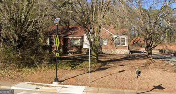 Premier Development Opportunity: Henderson at East Lake | 21 Luxury Townhomes Adjacent to Charles Yates Golf Course Presenting Henderson at East Lake, an exceptional opportunity for builders and developers to acquire a fully designed, thoughtfully planned townhome community in one of Atlanta's most desirable and rapidly growing neighborhoods. Strategically positioned next to the iconic Charles Yates Golf Course, this rare offering is ready for development. Situated across two parcels, this site is fully entitled for a 21-unit luxury townhome development and comes complete with architectural plans, site engineering, and a clear vision-offering the rare chance to deliver upscale townhomes within walking distance of East Lake Golf Club, East Lake Park, and just minutes from Downtown Decatur, Oakhurst, and the Atlanta BeltLine. Development Highlights: Total of 21 fee-simple townhomes across two adjacent parcels Modern, 3-level designs with 3-4 bedrooms and 2-car garages Premium golf course and park-facing units Open-concept floorplans, rooftop terrace options, and private decks (per plan) High-end architectural renderings and conceptual interiors included Gated community layout with private road and green space Site plan, civil engineering, and design packages convey with sale Zoned and approved with preliminary permits available upon request This project is ideal for a builder or boutique developer seeking a luxury intown product with strong resale potential. East Lake is experiencing a wave of revitalization and investment, making this the perfect time to deliver a high-end residential product that meets the demand of discerning buyers seeking proximity to nature, golf, and urban amenities. Surrounding Area Benefits: Direct access to Charles Yates Golf Course and East Lake Golf Club Close to top-performing schools and prestigious charter options 10-15 minutes to Midtown, Downtown, and Hartsfield-Jackson Airport Walkable to neighborhood parks, trails, dining, and retail hubs Easy access to I-20, I-285, and MARTA Offered as a package with 1936 Glenwood Ave