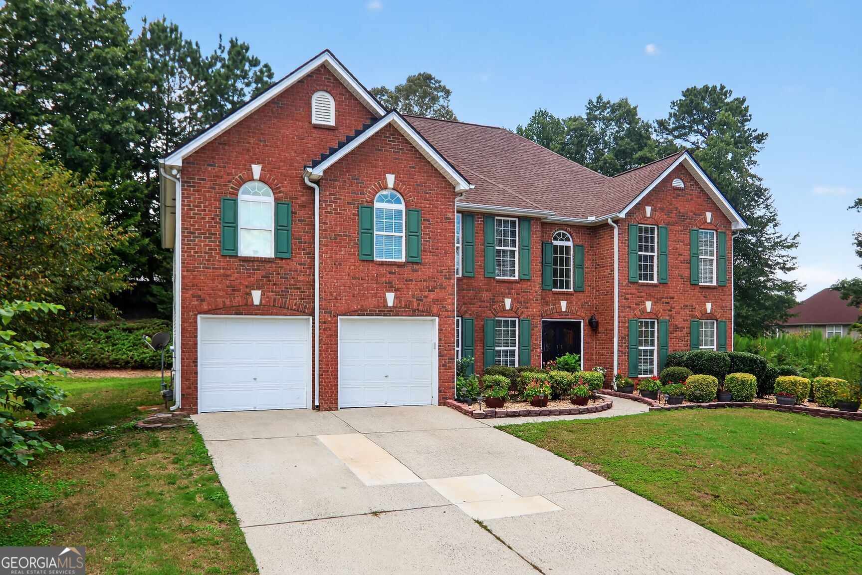 Welcome to Your Hilltop Haven in Lawrenceville Tucked peacefully at the top of a cul-de-sac in the highly desirable Paper Mill community, this spacious 5-bed, 4-bath beauty blends timeless charm with meaningful upgrades. Enjoy lush, manicured landscaping and new energy efficient windows that flood the home with natural light. The heart of the home a fully remodeled kitchen boasts granite counters, stainless appliances, and stylish finishes that make every meal feel special. Retreat upstairs to your serene primary suite with a sitting or baby room, a spa inspired bathroom and two oversized walk-in closets. With a total of five bedrooms, this home adapts effortlessly to growing families, multigenerational living, or work from home lifestyles. From the warm hardwood flooring to the brand newer roof, every corner of this home tells a story of care. Minutes from parks, shops, highways, and downtown Lawrenceville this is more than a home. It's your next chapter.