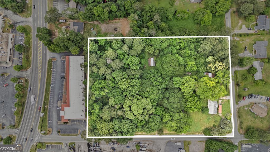 Photo of 7423 McElroy Drive, Riverdale, GA 30296 (MLS # 10686771)