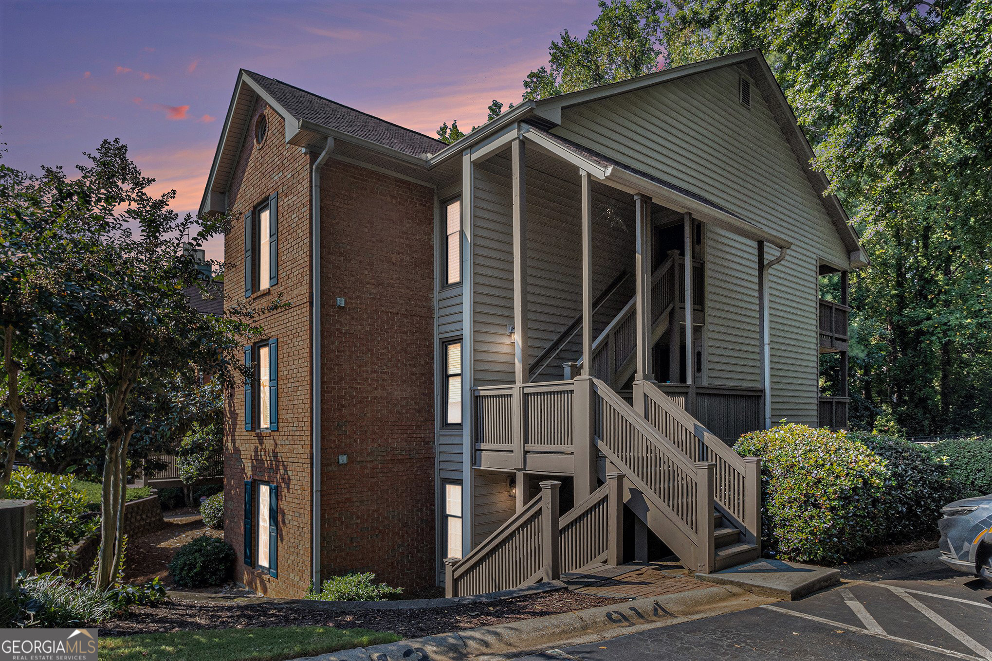 Great opportunity to live in the heart of Sandy Springs. Beautifully updated condo with open floor plan. Features spacious living room with cozy fireplace and hardwood floors, kitchen with granite, stainless and new lighting. Enjoy extra large primary ensuite and oversized secondary bedroom with updated guest bath. New windows. End unit, deck with private view. Move in ready. Designed for comfort, style and low maintenance living. Swim/tennis community with scenic lake. Walk to dining and shopping. Convenient to all expressways.