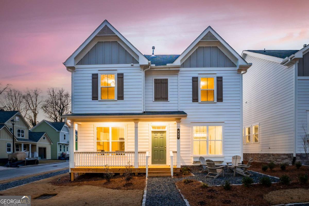 This charming Buford A plan (Lot 11), from Southwyck Homes, offers a gracious gathering and entertaining lifestyle for all. Boasting pure cottage influences from the 1920s and situated on a 6-acre tract at the northern edge of Clarkston, Parkside is an enclave of 36 intown cottages, moments from all that Decatur, Avondale Estates, and Tucker have to offer. Just steps from one of Intown Atlanta's most prestigious parks, Milam Park offers every amenity for a matchless intown living experience. With special attention to historical details, many homes face a central mews and are alley-fed in showcasing clean facades and inviting streetscapes, with quaint front porches that add to the sense of welcome and community. These carefully crafted homes pack all elements of city living together in these open floor plan where live/work often come together. The layout of the space is designed to allow you to create your own experience for the way you prefer to live in your new home - need room to host holiday dinners is there with a large living/dining room combo. The 5-star gourmet kitchen includes soft close painted cabinetry with quarts counter tops. The appliance package includes 5-burner gas cook surface, stainless hood, microwave drawer, farmhouse sink and generous walk-in pantry. Organization is a breeze with the spacious mud bench upon entrance from the garage. Upstairs the landing nook can be used as you need - a reading spot or a home office, without impacting the use of the secondary bedrooms. The owner's retreat is spacious and with a substantial, shared walk-in closet. The lavish spa-like bath has an oversized shower, double sinks set in quartz, and linen closet. Secondary bedrooms include spacious closets, and 1 has direct access into the upstairs secondary bath - and includes tile floors and tub surround along with quartz counter tops. Ask about $15,000 in incentives, 5% rate buy down rate and 100% financing for 1st time Home Buyers programs. On-site hours are Thursday/Friday 2:00-4:00 and Saturday/Sunday from 2:00-5:00