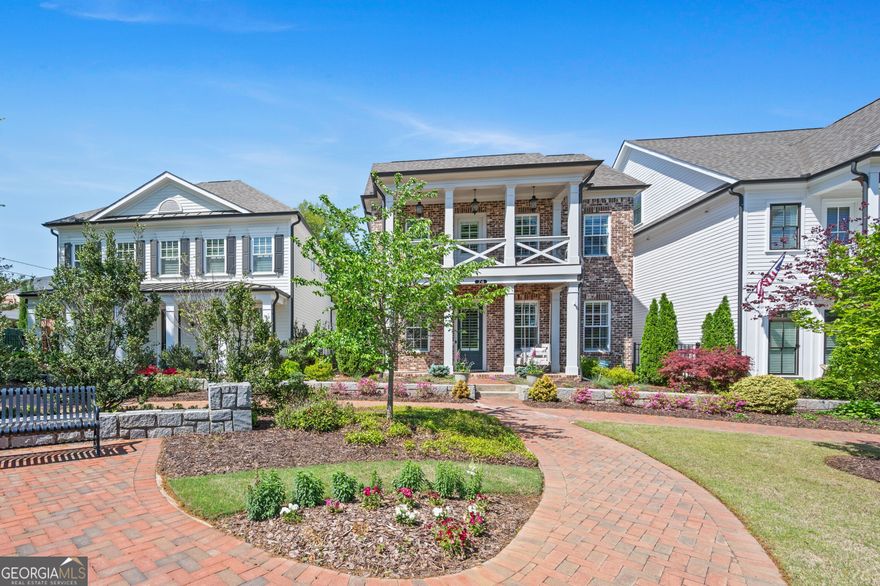 Welcome to this stunning home located in one of Alpharetta's most desirable and walkable communities! Nestled in the vibrant heart of downtown, this beautifully maintained property offers the perfect blend of charm, convenience, and modern comfort.  Step outside your front door and enjoy an effortless stroll to Alpharetta's best restaurants, boutique shopping, lively entertainment, and across from beautiful Brook street park. You're steps away from the Alpha Loop trail - perfect for walking or biking to Avalon.  Inside, you'll find an open and inviting floor plan filled with natural light, hardwood floors, and designer finishes.  The gourmet kitchen boast of stainless steel appliances, granite countertops, and a spacious island ideal for entertaining.  Relax in the cozy living room or enjoy evenings on one of the front porches or private side patio.  The primary suite is on the main level!!! It offers peaceful spa- like bath and a generous walk in closet.  Additional bedrooms are spacious and perfect for guest or a growing family.   You will also find a loft perfect for relaxing or an office.  This beautiful home comes with custom drapes, electric shades, and plantation shutters throughout.  With low-maintenance living and unbeatable access to everything Alpharetta has to offer, this home is truly a rare find.