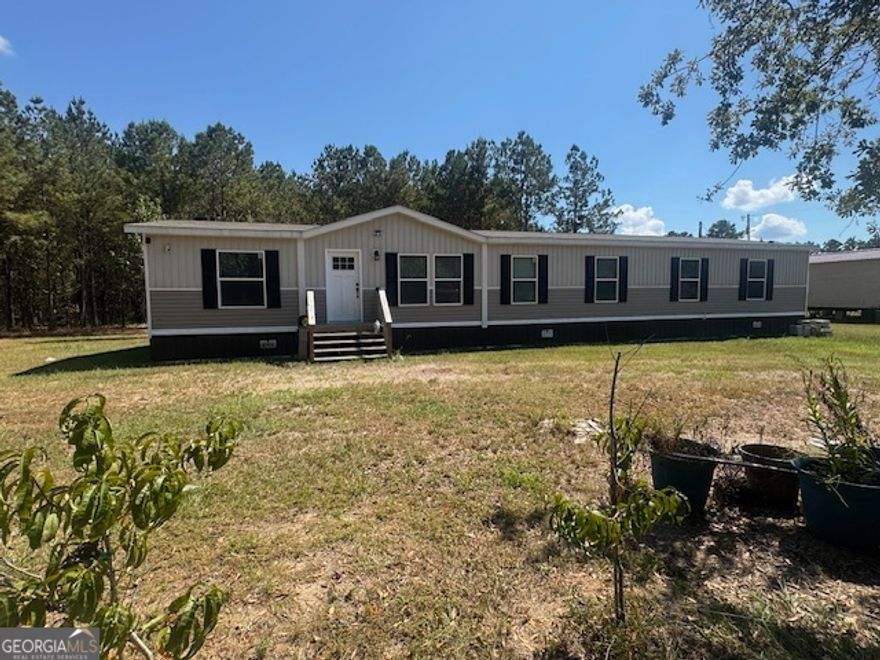 SPACIOUS PROPERTY WITH TWO HOMES ON 5 ACRES in DEXTER, GA!!     Discover the perfect blend of space, comfort, and opportunity on this beautiful 5-acre property in Dexter. The main residence is a well-kept mobile home offering a welcoming layout and plenty of room for everyday living, offer in 4 Bedrooms, 3 Full Baths, an office, and a craft room!!  In addition, a second home sits on the property, providing excellent potential as a rental income property, guest house, or multi-generational living. A large area has been cleared off the main road and could serve as the site of another home or mobile home!   With five acres of land, you'll enjoy both privacy and room to expand-ideal for gardening, outdoor activities, or simply soaking in the peaceful country setting. Conveniently located near Dexter and just a short drive to nearby towns, this property combines rural living with easy access to local amenities.    Whether you're looking for an investment opportunity or a place to put down roots with extra space for family, this versatile property is full of potential. (Home is Occupied, Showings are By Appointment Only)