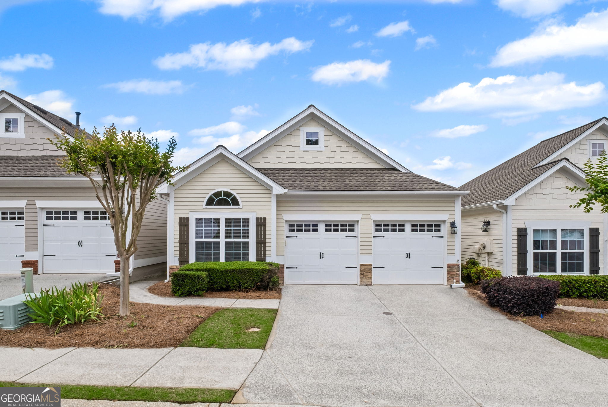 Fantastic one level living providing no stress exterior maintenance. Enter this freshly painted, light filled home to a vaulted family room with skylight, custom built ins, fireplace with gas logs. Open floor plan features a kitchen with ample cabinets, breakfast bar, and stone countertops open to family room. Primary retreat boasts NEW carpet and attached sunroom/office. Primary bath provides double vanity, walk in shower and spacious walk in closet. Sought after adult community provides many amenities.