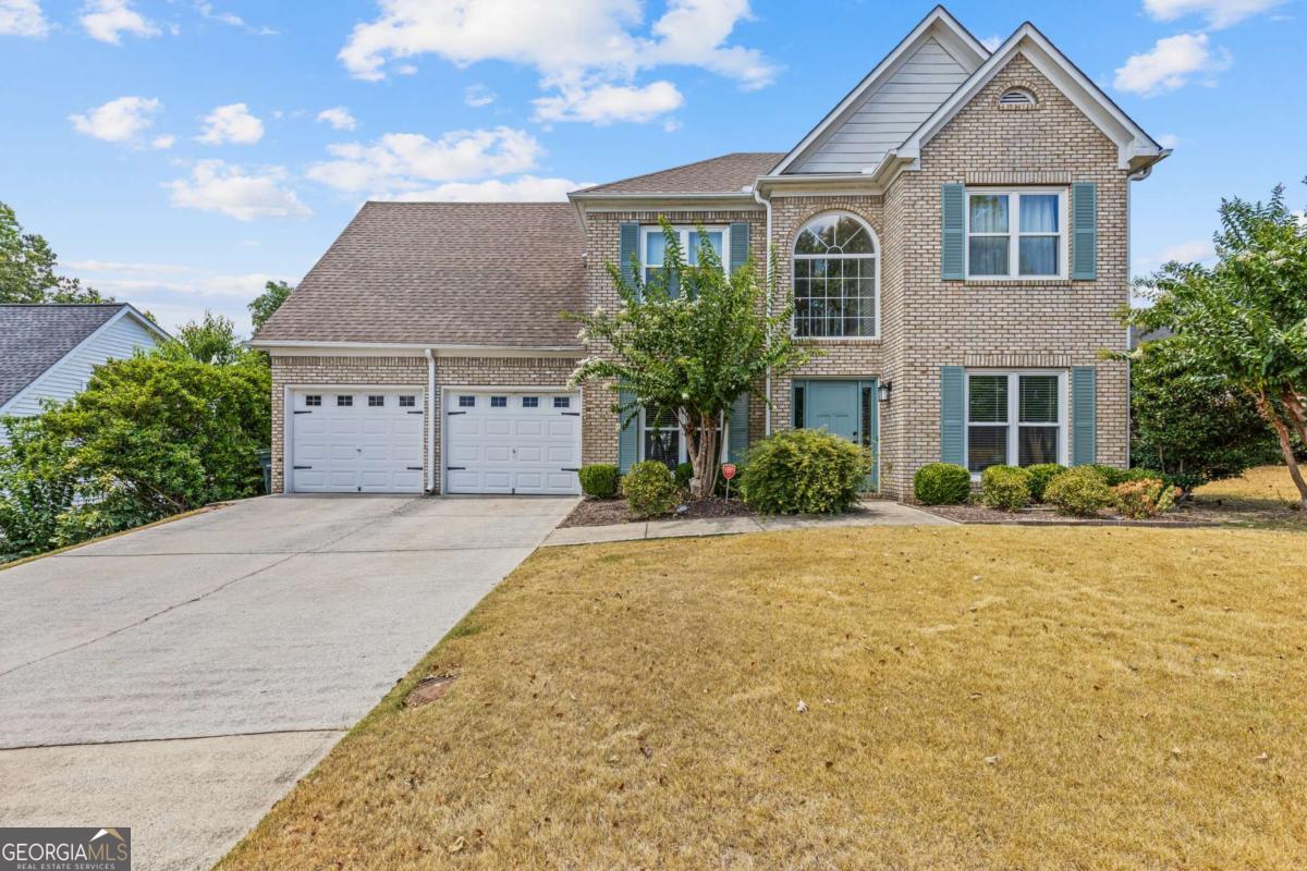 Step into this stunning, already furnished home in Eagle Ridge, East Cobb, boasting a prime level lot that backs up to the tranquil Rebel Ridge Green Space. The dream backyard is perfect for entertaining. The home is flooded with natural light and features an open floor plan with numerous updates. The fabulous eat-in kitchen showcases white cabinets, granite counters, stainless steel appliances, a breakfast bar, and flows seamlessly into the two-story family room with a cozy fireplace. Hardwood floors grace the main level, which also includes a versatile living room ideal for an office or playroom, a separate dining room, a renovated guest bathroom, and a convenient laundry room. Upstairs, the primary bedroom offers two closets, including a spacious walk-in closet, and a renovated bathroom with a new double vanity, mirrors, garden tub, and separate shower. Recent updates encompass new windows, a front door, lighting, and two new HVAC systems. Outside, the private backyard features a newer two-tiered deck with a pergola and outdoor television, as well as a lush sodded lawn and a fenced yard. Washer and dryer are included with rent.