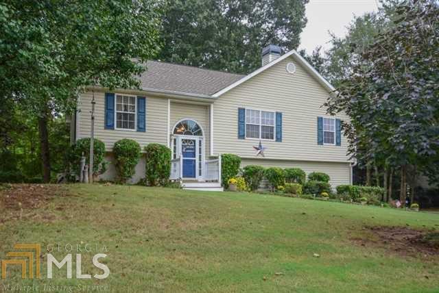 Move in ready split foyer with only 2 steps to front door! Vaulted great room w/stacked stone fireplace w/gas logs. Large eat-in kitchen w/SS refrigerator, dishwasher, microwave & black stove. Roommate floor plan. Master suite w/trey ceiling, garden tub, separate shower & single vanity. Lower level has 12x23 room that could be used as 4th bedroom or rec room. Workshop in garage. Back yard is wooded & private. Upper deck plus main level sitting area. Home is close to shopping & just minutes to schools.