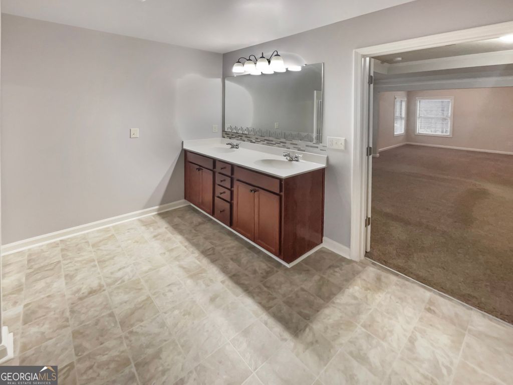 Photo of 690 Collingsworth Lane, Lawrenceville, GA 30043 (MLS # 10671450)