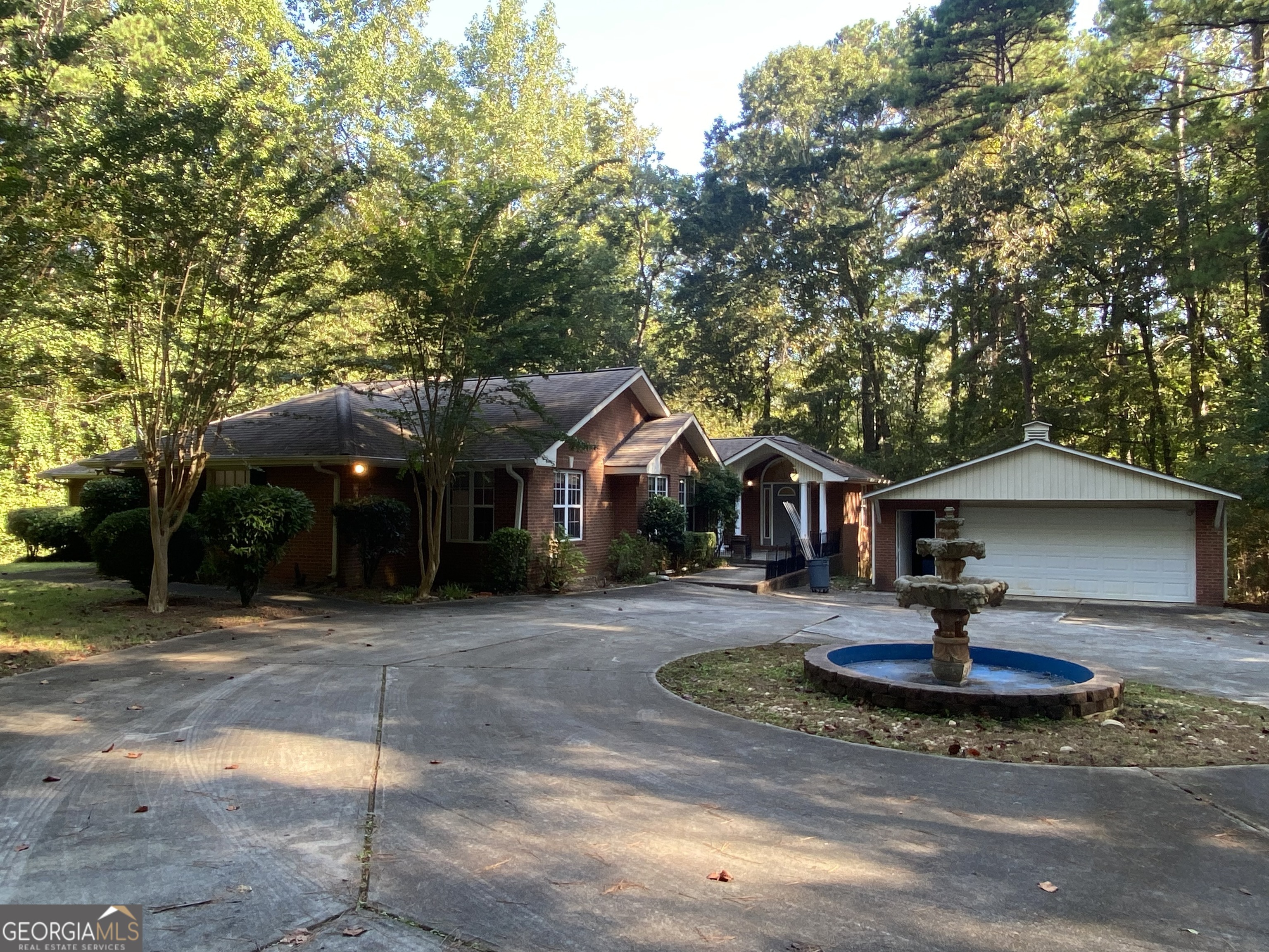 Beautifull and private all brick ranch. 2 car detached garage with circular driveway with water feature. Hardwood floors and some carpet. Carved wood trim throughout. Large Master with plenty of closet space and seating. 2 Family rooms and a Sun Room! Dining room with bookshelves and a second Master with en suite. Laundry room, Kitchen boasts a gas range, dishwasher and refrigerator. There is over 3000 square feet ot make your own. Must see!