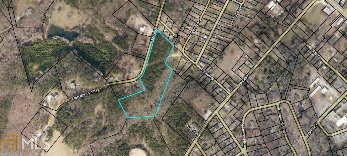 PERFECT SIZE!! 9.7 ACRES IN CITY LIMITS. WOODED, GREAT FOR BUILDING OR DEVELOPING. PLENTY OF PAVED ROAD FRONTAGE. CLOSE TO SCHOOLS AND BUSINESSES. DRIVEWAY IN PLACE.