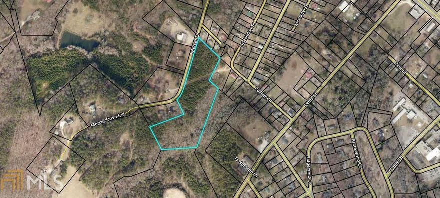PERFECT SIZE!! 9.7 ACRES IN CITY LIMITS. WOODED, GREAT FOR BUILDING OR DEVELOPING. PLENTY OF PAVED ROAD FRONTAGE. CLOSE TO SCHOOLS AND BUSINESSES. DRIVEWAY IN PLACE.