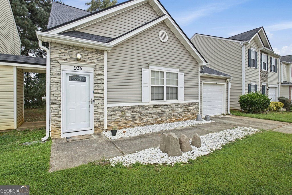 Photo of 935 Lakeside Circle, Covington, GA 30016 (MLS # 10853991)