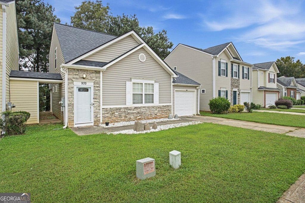 Photo of 935 Lakeside Circle, Covington, GA 30016 (MLS # 10853991)