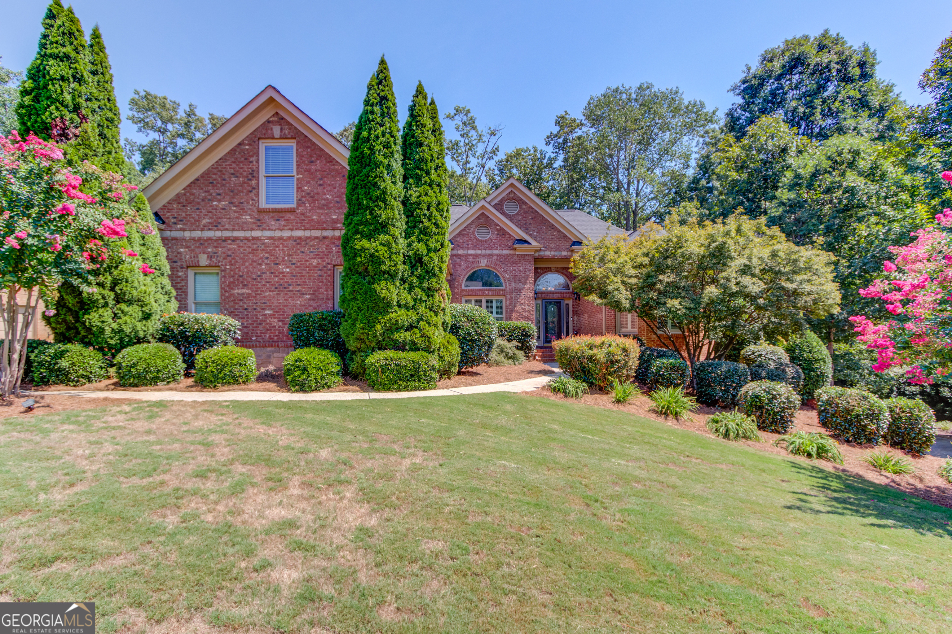 Welcome to 315 Fountainhead Drive, an impeccably maintained 4-bedroom, 4-bath home located in one of Jefferson's premier neighborhoods and within the sought-after Jefferson City School District. This property combines timeless design with thoughtful updates, offering multiple levels of living space and a private backyard retreat designed for year-round enjoyment. Inside, the main level showcases a custom kitchen with granite countertops that opens to the breakfast area and a keeping room with vaulted ceilings and a stacked-stone fireplace. A formal dining room and a spacious great room with a second fireplace make this home perfect for both everyday living and entertaining. The oversized owner's suite includes a sitting area, vaulted ceiling, dual vanities, Jacuzzi tub, dual-head shower, and walk-in closet. Upstairs, you'll find a versatile bonus room with a full bath, ideal for a bedroom, office, or playroom. The finished terrace level is filled with natural light and offers a massive living area with built-in bookcases, a full second kitchen with stainless appliances and granite countertops, an additional bedroom and bathroom with washer/dryer hookups, and a private driveway with access to a side garage/workshop-making it perfect for an in-law suite, tenant, or guest space. (Don't miss the hidden room-ask your agent for details!) Step outside to your backyard oasis, where a sparkling saltwater pool with hot tub, stone fire pit, and lush professional landscaping create the perfect setting for entertaining or relaxing. This home also offers peace of mind with major updates, including a new roof (2023) and all HVAC systems replaced (2024). Additional touches such as plantation shutters and crown molding add to its charm and quality. 315 Fountainhead Drive isn't just a home-it's a retreat waiting for you.
