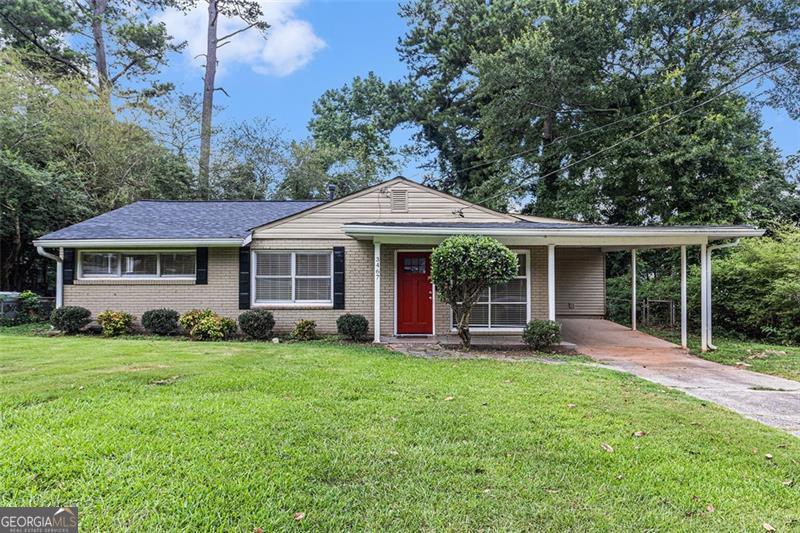 This ranch-style home features a 3/1 layout, a covered carport, and is in good condition. The property offers a spacious backyard, providing ample outdoor space for various uses. Its single-level design adds to the overall accessibility and functionality.