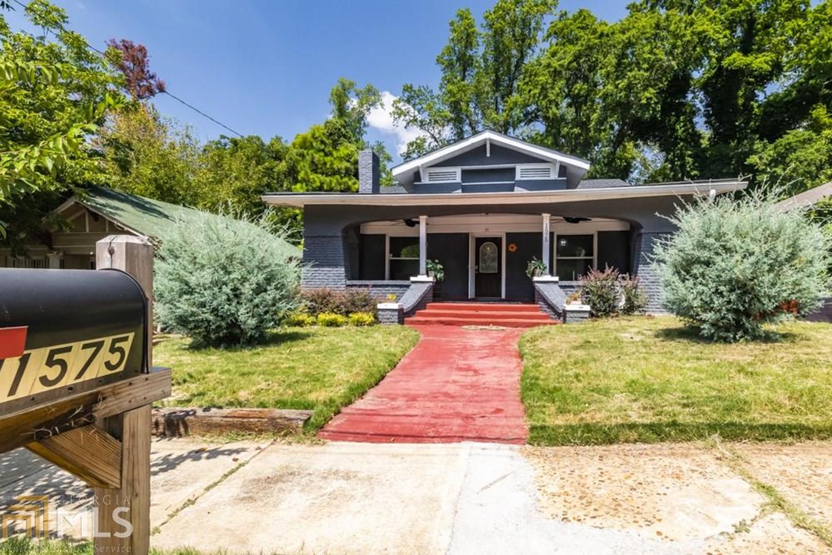 Westview, classic Craftsman has unbuildable charm! 4-side brick & signature front porch welcomes you to soaring 10’+ ceilings, wide hallway & original hrdwd floors. Main floor boasts comforting living room w/ original fp, lg dining rm & 3 bdrms. Updates incl modern kitchen finishes, all new windows & new lighting fixtures. Original butler’s pantry now a spacious laundry rm & pantry. Upstairs is an open suite retreat w/full bath. Need more? There is 1 /1 apartment w/private entrance, tiled living room & kitchenette. Minutes from the beltline, multiple restaurants & breweries it would be a great AirBnb or other rental income. Private driveway & lg fenced backyard is ready for your to create your own outdoor paradise.