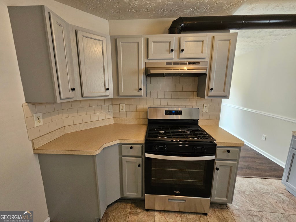 Photo of 5225 Tussahaw Crossing, McDonough, GA 30252 (MLS # 10837170)