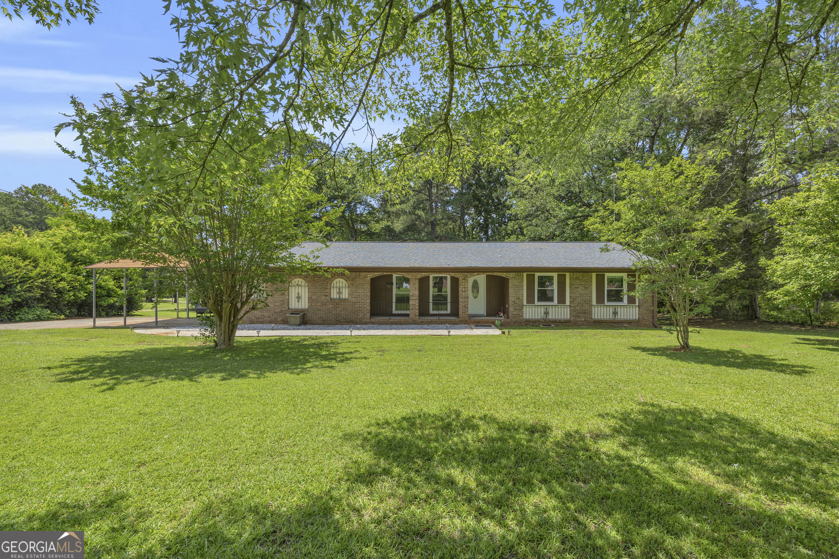Privacy meets convenience in this beautiful ranch home. Enjoy your coffee in the heated/cooled sunroom or on your back deck. This home will allow you to have your chickens free range and your dogs to run! Sitting on just around 2 acres, you have room to entertain, BBQ, put that pool in that you have always wanted or just enjoy the peace and quiet. This home has a newer roof, has access to city water or private well. Updated full bath and added half bath make this home stand out in the marketplace. This home needs minimal love to make it your own. Sellers need to relocate makes this well maintained home one you don't want to miss. PRICED TO SELL. DON'T miss this opportunity to own your first home or downsize to a solid built ranch home!
