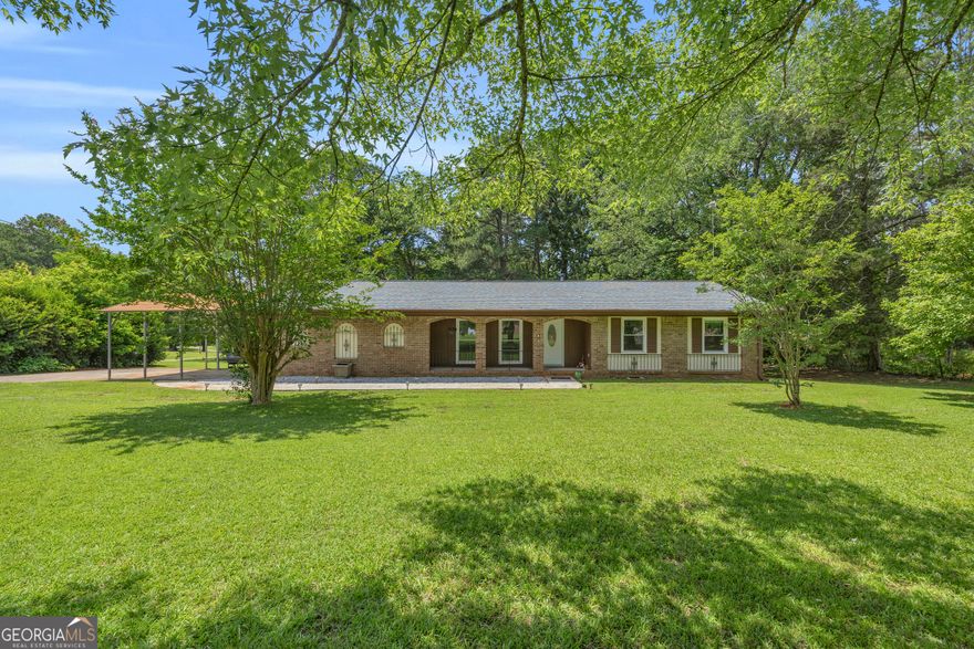 Privacy meets convenience in this beautiful ranch home.  Enjoy your coffee in the heated/cooled sunroom or on your back deck.  This home will allow you to have your chickens free range and your dogs to run!  Sitting on just around 2 acres, you have room to entertain, BBQ, put that pool in that you have always wanted or just enjoy the peace and quiet.  This home has a newer roof, has access to city water or private well.  Updated full bath and added half bath make this home stand out in the marketplace.  This home needs minimal love to make it your own.  Sellers need to relocate makes this well maintained home one you don't want to miss.  PRICED TO SELL.  DON'T miss this opportunity to own your first home or downsize to a solid built ranch home!