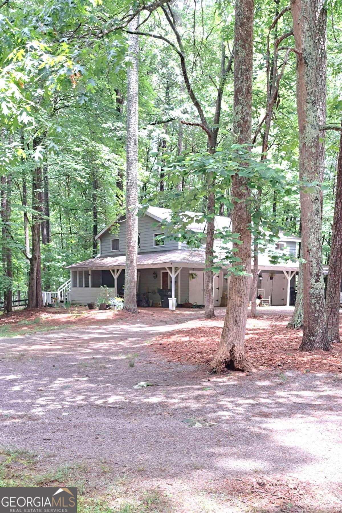 Escape to peaceful living in this furnished garage apartment*Nestled in a wooded, tranquil setting surrounded by horse farms and natural beauty. Gorgeous private area of Cherokee county with an Alpharetta address. Well water, mature trees abound. One car garage included. Move-in ready August 1st. Just bring the suitcase! Tenants are also welcomed to bring furnishings as well.