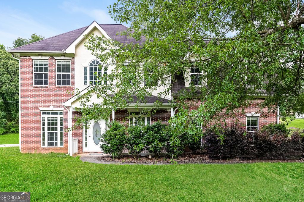 Photo of 349 Plantation Circle, Fayetteville, GA 30214 (MLS # 10625183)