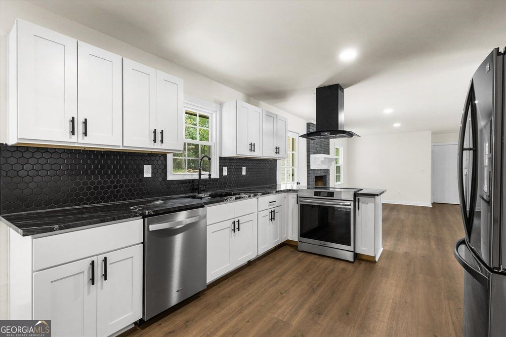 Photo of 1674 Lamancha Drive NW, Lawrenceville, GA 30044 (MLS # 10869241)