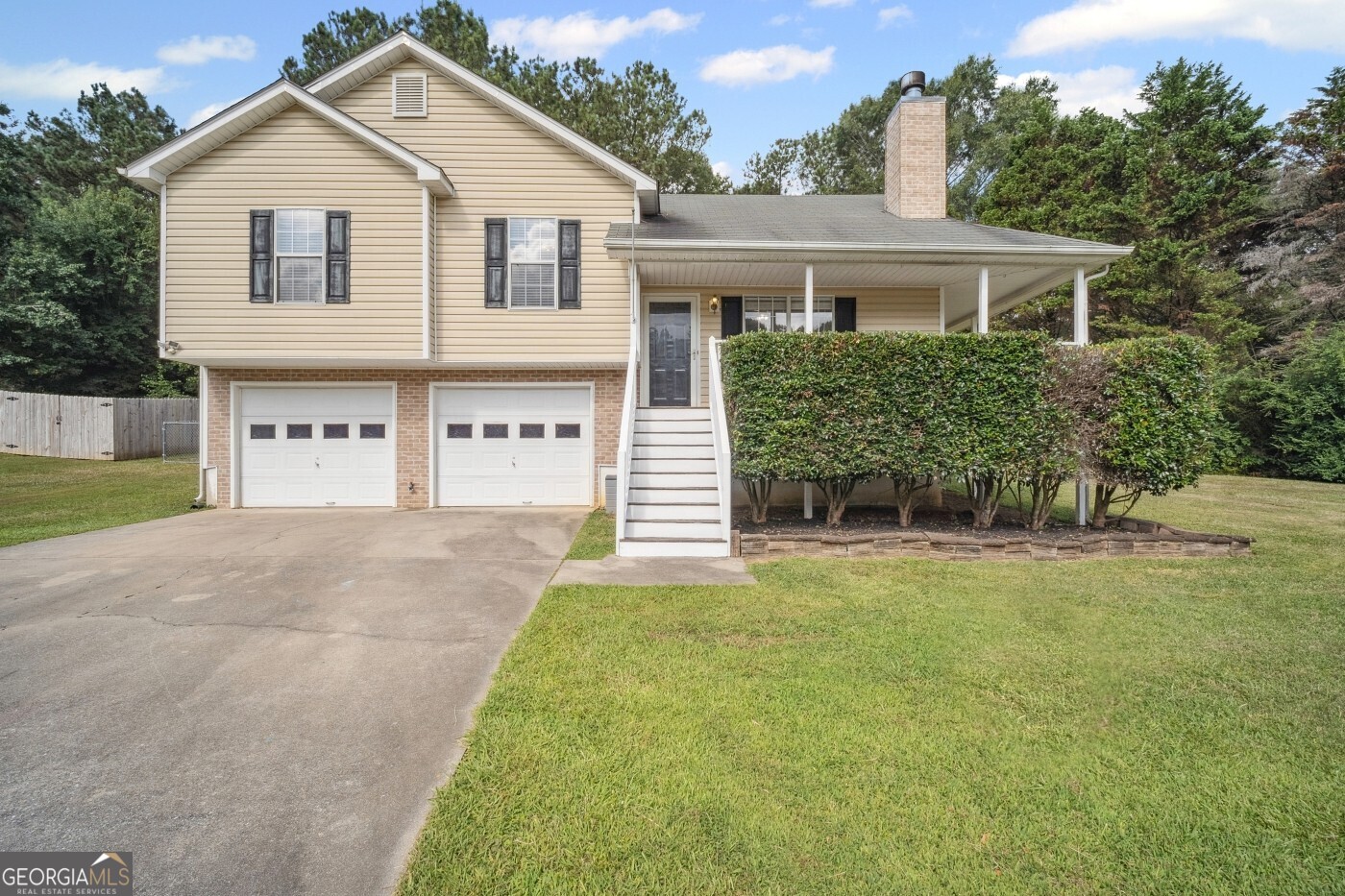 Welcome to this adorable 3-bedroom, 2-bath home sitting on nearly an acre, in a quiet, established neighborhood with no HOA. Step inside to find vaulted ceilings, warm hardwood floors, and a bright, open living space, anchored by a cozy fireplace. The spacious eat-in kitchen comes equipped with appliances, tile back splash, and opens to a private deck and fully fenced backyard, ideal for relaxing evenings or entertaining under the stars. Recent upgrades include energy-efficient windows and a newer HVAC system, offering both comfort and peace of mind. Located in a highly rated school district and just a short drive to Cartersville or Rome, this move-in ready home combines convenience, character, and space to grow. Come see why this one won't last long.