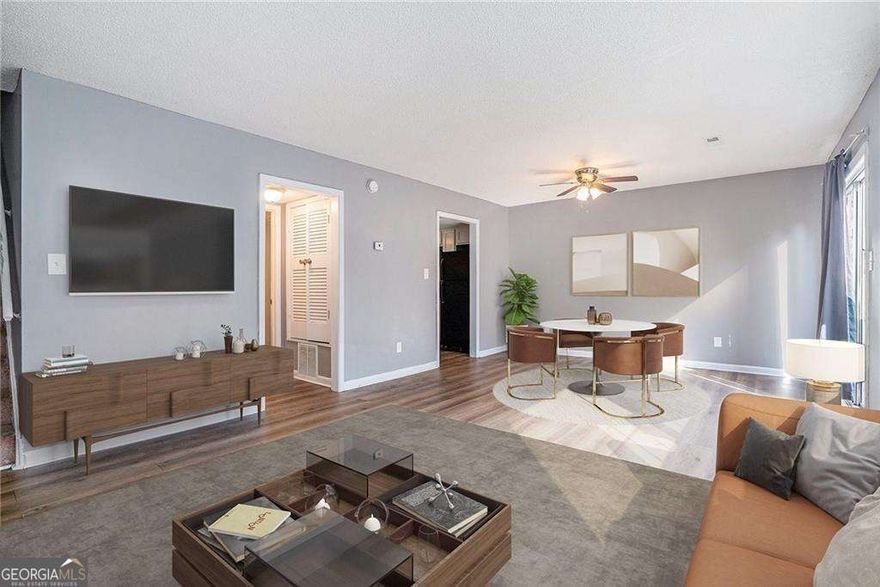 Move in ready! Welcome to your dream home! This beautifully designed space features luxury vinyl tile flooring that adds both style and durability throughout the living areas. The kitchen is a chef's paradise, boasting elegant granite countertops that provide ample space for meal preparation and entertaining. Relax in the spacious bathroom, where you'll find exquisite marble countertops that elevate your daily routine. Enjoy the added privacy of a private fenced area, perfect for outdoor relaxation or entertaining guests. This condo combines comfort and sophistication, making it the perfect place to call home.FHA,VA and Conventional is accepted ! No rental restrictions as well! New HVAC(2025)