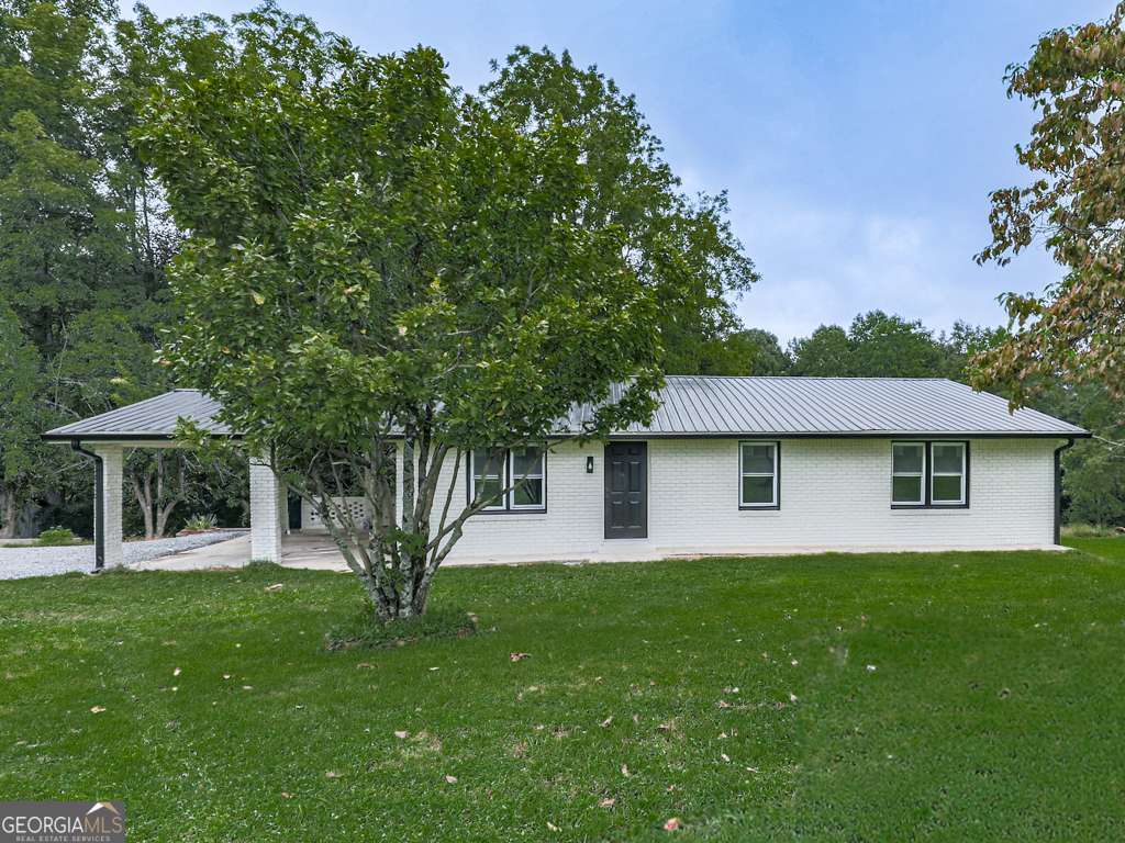 Rare Opportunity - minutes to Downtown Jasper! $10,000 CLOSING COST CREDIT OFFERED WITH ACCEPTABLE OFFER! This fully renovated four-sided brick ranch offers the perfect blend of timeless charm and modern living. Featuring 3 bedrooms, 2 bathrooms, and 1,496 sq. ft. of thoughtfully designed space, this home sits on a spacious .75-acre lot just minutes from the heart of Jasper. The exterior has been refreshed with crisp white paint and a sleek metal roof, creating stunning curb appeal. Step inside to discover a completely gutted and reimagined interior with an open-concept floor plan, brand-new kitchen with quartz countertops and custom cabinetry, and new flooring throughout. Both bathrooms have been beautifully gutted and updated, offering a fresh and modern feel in every corner of the home. Enjoy the convenience of being within MINUTES to downtown Jasper's Roper Park, shops, restaurants, hospital, and more, with quick access to Highway 515 for an easy commute. This one won't last long-schedule your showing today!