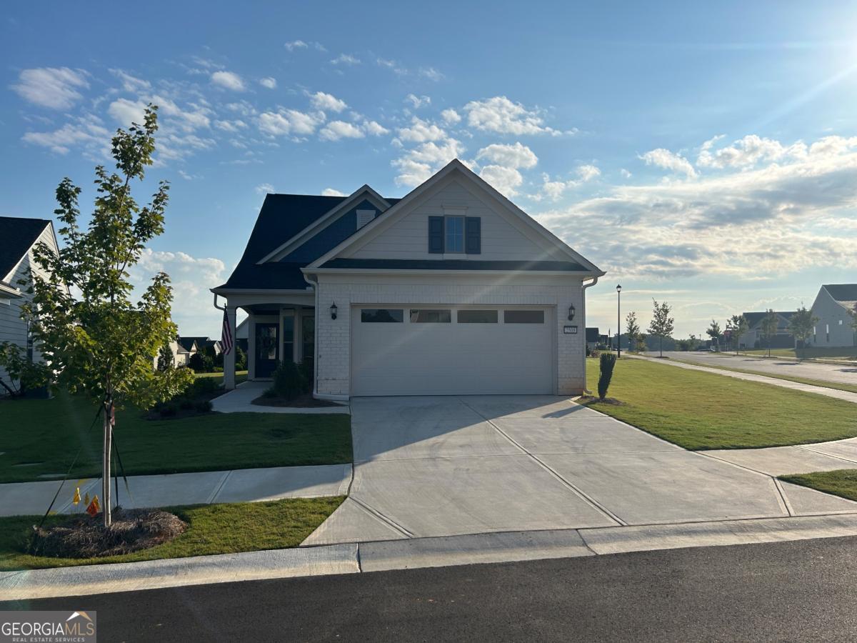 Stunning 3BR / 3BA in Del Webb Chateau Elan - 55+ Resort-Style Living. Why wait for new construction when you can move right into this like-new, highly upgraded home in the sought-after Del Webb Chateau Elan community? Perfectly positioned on a corner lot, this 3-bedroom, 3-bath beauty combines modern elegance with thoughtful design, offering both comfort and convenience. Step inside to find an inviting open layout filled with natural light, designer finishes, and custom touches throughout. The chef's kitchen shines with upgraded cabinetry, farmhouse sink, and premium Whirlpool appliances-perfect for entertaining or everyday living. The spacious owner's suite is a retreat of its own, featuring a coffered ceiling, accent wall, and spa-like bath with upgraded mirrors, tile shower, and added natural light. Upstairs, guests will enjoy a private suite with bedroom, full bath, and living space. Throughout the home you'll find luxury vinyl plank flooring, upgraded lighting, and five ceiling fans for year-round comfort. The outdoor living space is a true highlight. Relax on the screened back porch complete with ceiling fan, heater, and TV mount, or step out onto the extended concrete pad-ideal for grilling and gatherings. The garage is a dream, with an epoxy-sealed floor, extension for extra space, and walk-up lighted overhead storage. All of this comes with the unmatched amenities of Del Webb Chateau Elan-resort-style clubhouse, pools, fitness center, tennis, pickleball, and endless opportunities to connect with neighbors in this vibrant 55+ community. This is the rare chance to have it all-new construction feel, custom upgrades, and immediate move-in. Welcome home!
