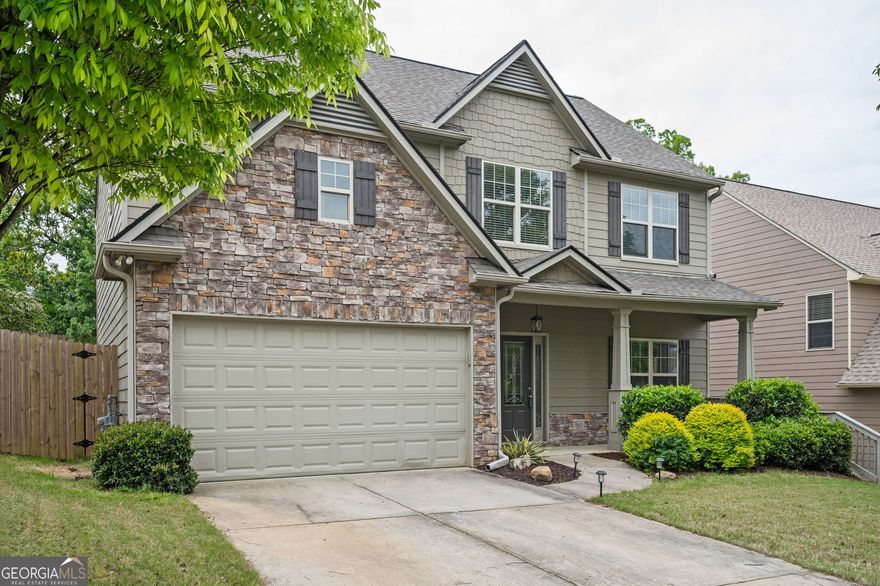 Introducing this stunning 4-bedroom, 2.5-bathroom, 2-story single-family home that epitomizes comfort and convenience. Step inside to discover a welcoming formal living room and a separate formal dining room, perfect for hosting guests or enjoying family meals in style.    Unwind by the fireside in the cozy family room, seamlessly connected to the kitchen, creating an ideal space for entertaining. The kitchen boasts functionality and charm, making meal preparation a joy.    Step outside to the fenced rear yard, complete with a patio, ideal for summer barbecues and outdoor gatherings. Upstairs, you'll find all four bedrooms, including the spacious primary suite featuring a luxurious bathroom with double sinks, a separate shower, a garden tub, and a walk-in closet. Additionally, the convenience of an upstairs laundry room adds ease to your daily routine.    This home also features an attached 2-car garage with automatic openers, ensuring both security and convenience. Situated close to shopping, restaurants, banks, and other amenities, and just 2 miles from the I-285 on-ramp, this residence offers unparalleled accessibility.    Don't miss the opportunity to make this your new home. Schedule a showing today and experience the perfect blend of comfort, convenience, and charm!