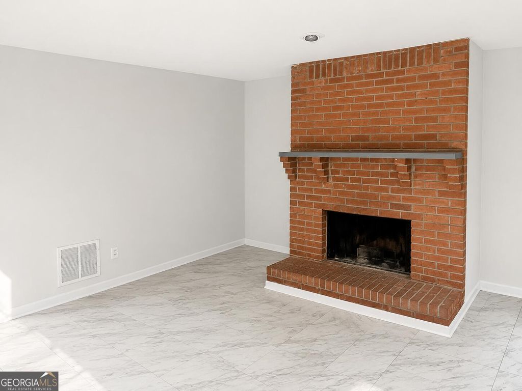 Photo of 5590 Windwood Road, Atlanta, GA 30349 (MLS # 10769470)
