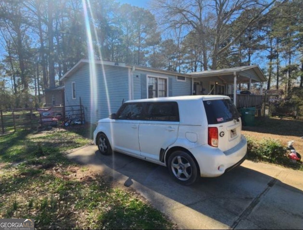 Photo of 798 Peeksville Road, Locust Grove, GA 30248 (MLS # 10825723)