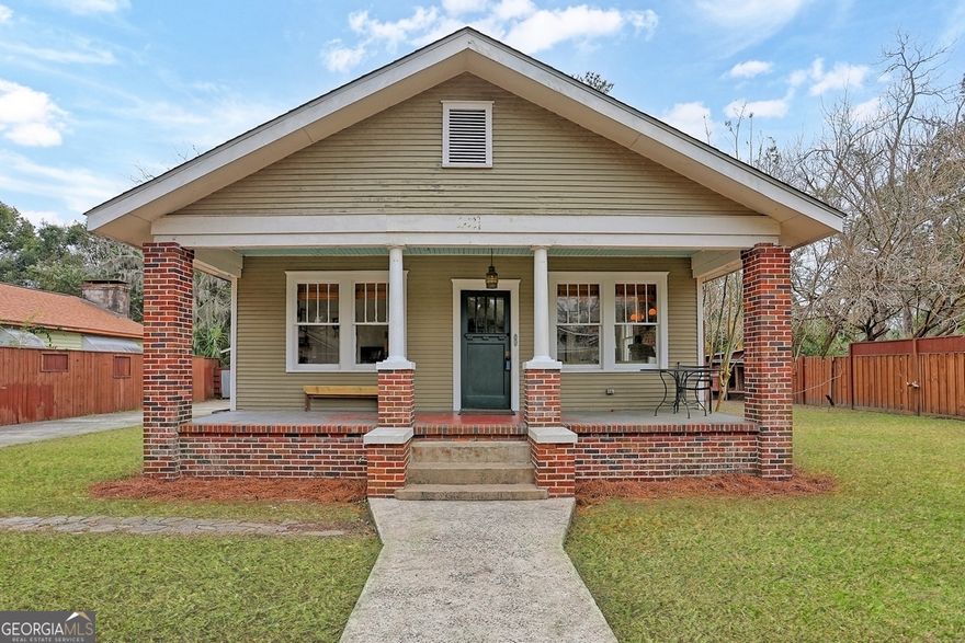 Charming 1930 bungalow, once the second farmhouse of the historic Roberd's Dairy Farm! Steps from wooded trails, marsh, organic Victory Gardens, and Pegasus Riding Academy, this home is an artist's oasis. With 1,487 sq. ft., it features 3 spacious bedrooms, 2 full baths, and a sunlit sunroom/laundry room. The oversized kitchen is perfect for entertaining. A large detached garage offers two versatile spaces: a woodworking/storage area and a climate-controlled art studio with vaulted ceilings, track lighting, and a skylight. The expansive yard boasts a deck, 8' custom privacy fence, and a charming chicken coop. Don't miss this unique home filled with history and character-schedule your private showing today!