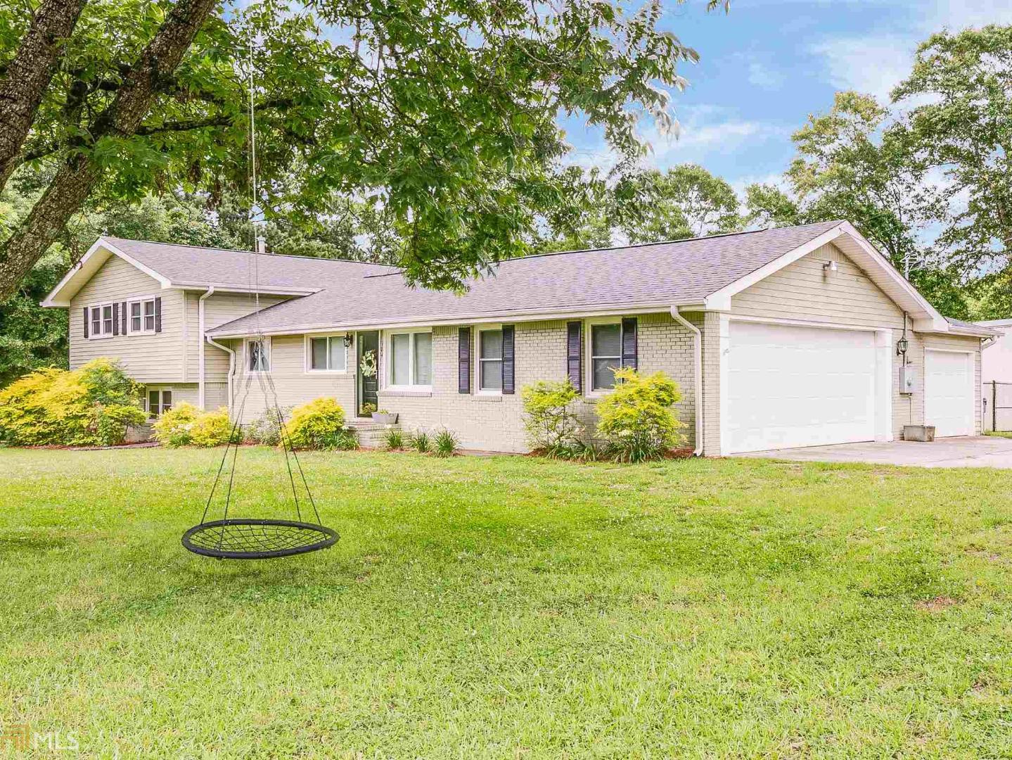 WOW! Everything you need is right here! This beautiful multi-level home has been recently renovated, has extra family/living spaces, three car garage and a huge detached shop for the handyman and storage. NO HOA OR SUBDIVISION! No detail has been overlooked, refinished hard wood floors, double vanities, new paint, new hot water heater, leathered granite counter tops, new lighting and so much more. A third car attached garage and a detached workshop with over 1800 square make this home a handy-mans dream!