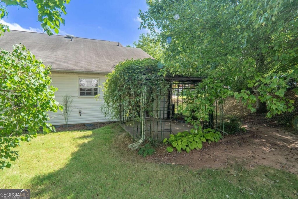 Photo of 209 Cottonwood Creek Circle, Canton, GA 30114 (MLS # 10846900)