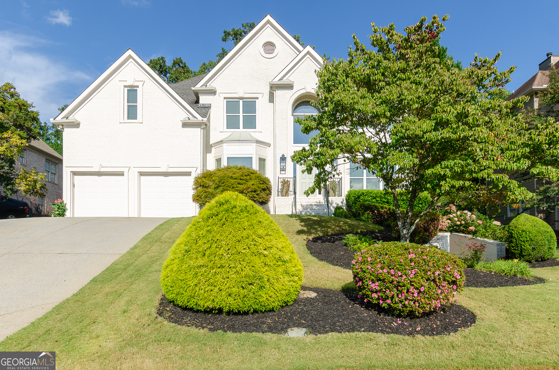 The City of Suwanee has been a top place to live in the entire country for many years. The North Gwinnett school district is one of the best school districts in the state. Morningview is a highly in demand neighborhood and the Westbrook section is one of the most exclusive! This 6 bedroom, 5 full bath home as been extensively updated throughout both the interior and exterior. A two page list of updates can be provided. Full exterior paint including the front brick. New exterior and interior lighting including motion sensing flood lights. Recently added 3rd car parking pad making parking multiple cars or having guests no problem at all. Full master bathroom remodel done less than 5 years ago. The entire footprint of the bathroom was modernized. Don't forget check out the master bathroom mirrors which are actually medicine cabinets and under the right side sink for a pull out drawer designed to keep hair styling tools at the ready and conveniently stored. Every bedroom closet has custom finished to maximize use of space and eliminate the need for dressers making bedroom feel even more spacious. In the fully finished basement you can enjoy movie night in the theater room which features custom built-ins. The basement is ideal for a teen or visiting family or even to house a tenant! There is a kitchenette and beautiful stone fireplace. Two additional storage areas are also in the basement complete with shelving, a workshop area and a utility sink. There is a private side walk-out door which would facilitate the ability for someone to access the basement without disturbing the main area of the house. With a side walk out from the basement, that means that the backyard is at eye level meaning you can easily keep an eye on kids ang pets playing and enjoying the full backyard renovation. The original deck was removed and a custom stamped concrete patio was added that spans the width of the entire back side of the house. Now there is a peaceful place to enjoy the outdoors and play/practice sports and entertain. The rear yard also features an attractive wrought iron fence that is only 3 years old. The side yard also has a paver pad to perfectly hid your trash cans, freeing up your garage space and keeping you in compliance with the HOA rules and regulations which keep Morningview such a desirable neighborhood. Being a homeowner in Morningview also gives you access to Suwanee's most coveted amenities campus. There is a main pool that features a mushroom and a waterslide. There is also a separate, shallower kiddie pool, a splash pad and a second, separately fenced pool that is lovingly referred to as "the serenity pool" The clubhouse is rentable, features a kitchen, bathrooms with a shower and a fitness center. You are so very close to downtown Suwanee and Town Center Park with all of the shopping and dining options and where you can enjoy all of the city's festivities including concerts, movie nights, food trucks, festivals and 5K's! Lastly, within the last year a new trailhead was added within Morningview where you can walk, run or bike to Town Center or to your kids baseball, softball, soccer or football practice/game at George Pierce Park (your polling place is also here!) So come...check it out...and imagine your perfect suburban lifestyle in this near perfect home!
